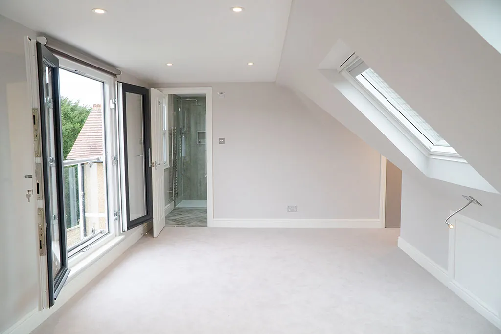 Loft room with Juliet balcony doors and rooflights